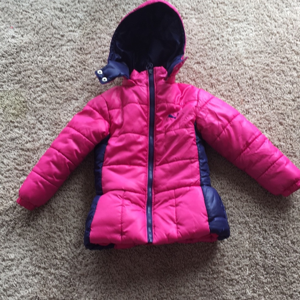 Pink and navy blue winter puffer coat.